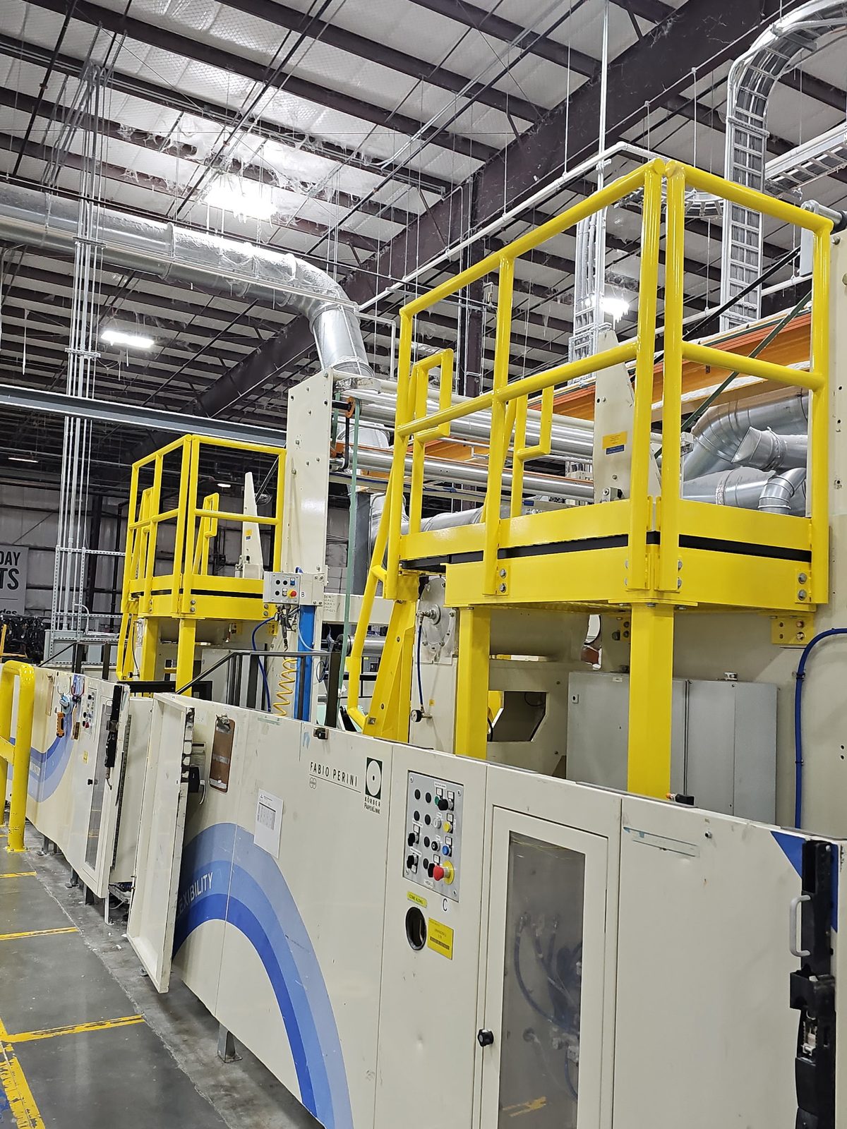 Fabricated safety platforms inside a manufacturing plant