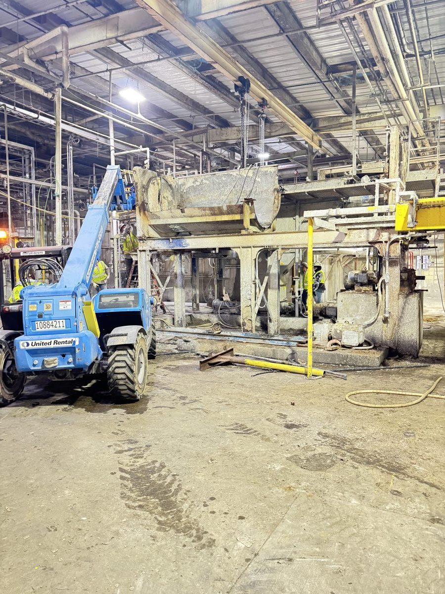 Heavy equipment rigging inside an industrial facility